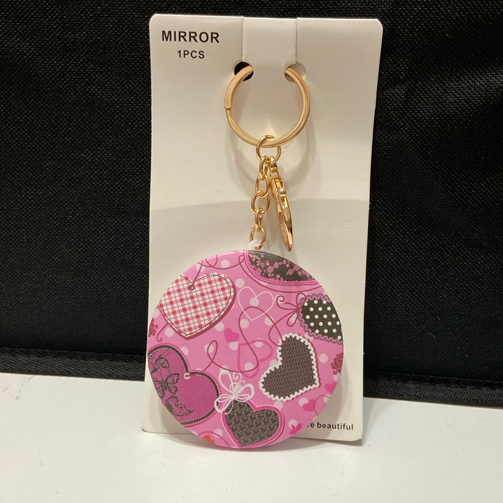 NIP - Keychain Mirror